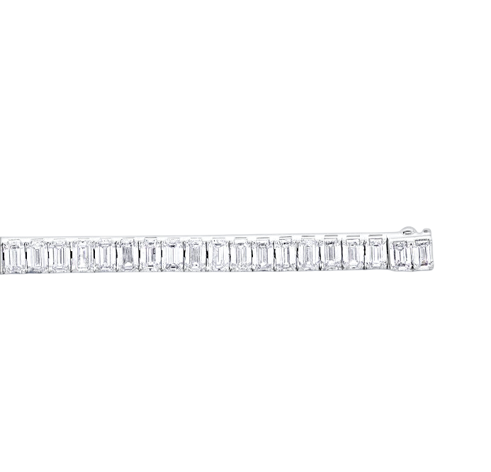 A long, elegant silver bracelet adorned with numerous small, clear diamonds.